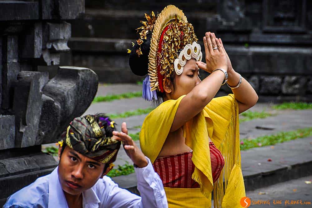 Bali temples - A woman praying in Pura Besakih