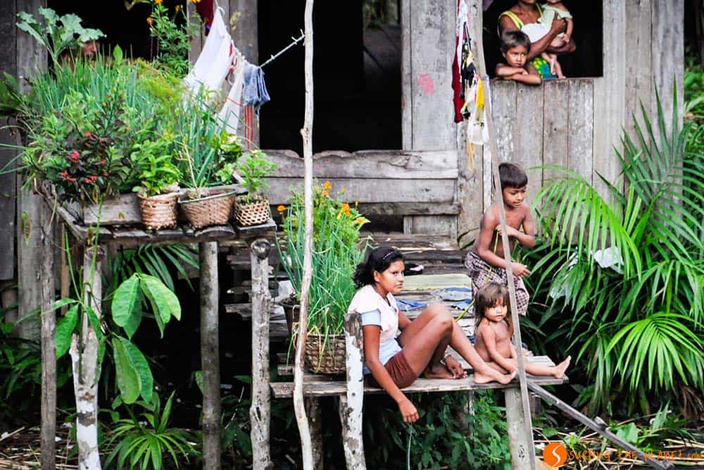 Family in flooded village - Amazon Rainforest